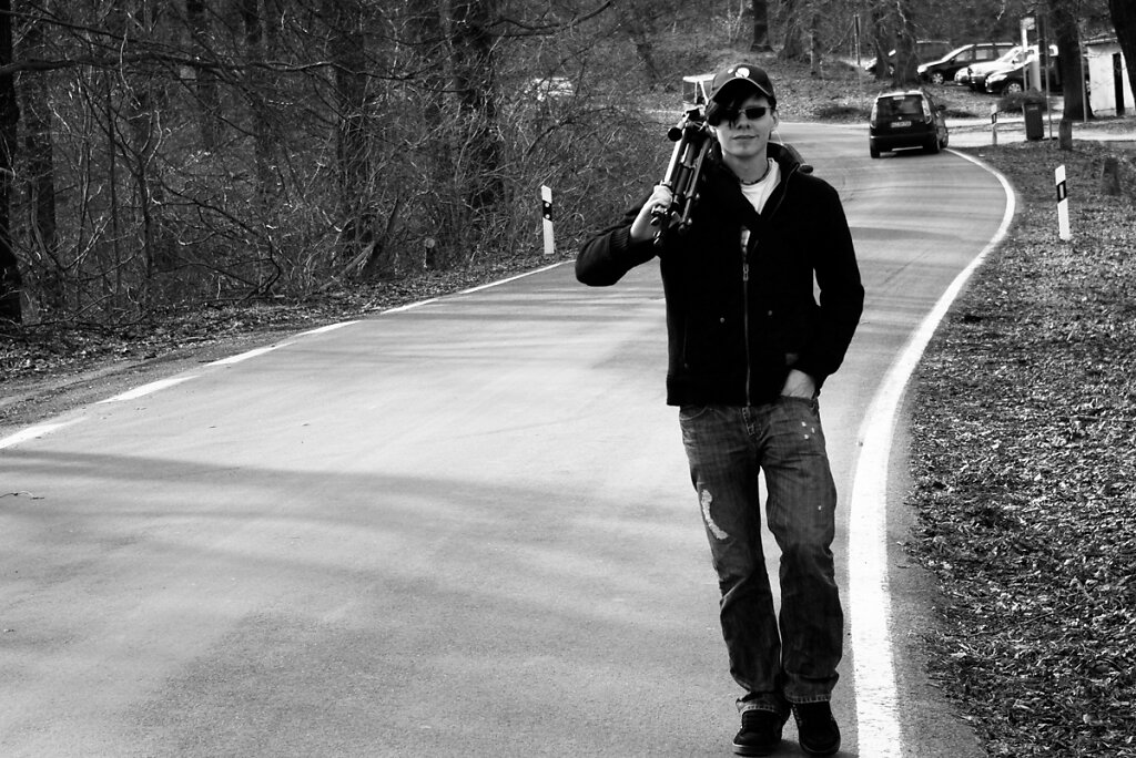 Fotograf und Stativ